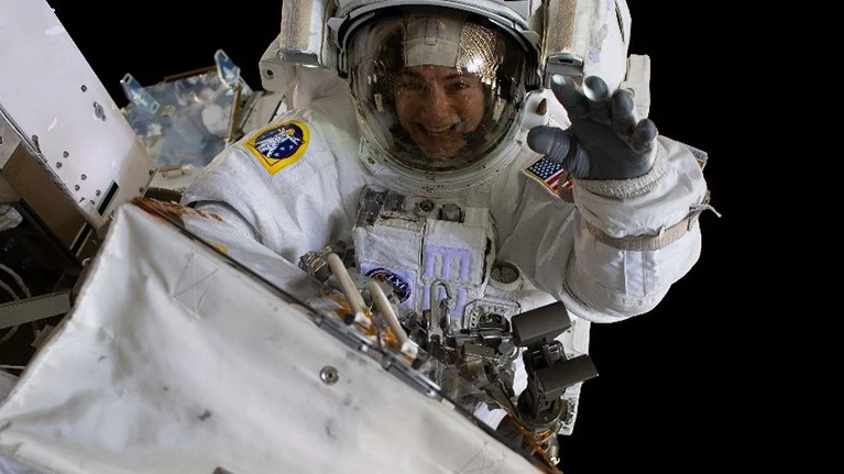 astronaut waving